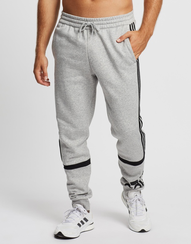 Adidas essentials best sale logo cuffed pants